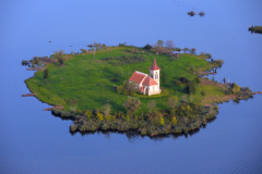 View from the basket of a hot air balloon at Church of St. Linhar