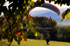 A Paraglider prepare to take off from Kozakov hill