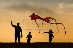 People are flying kites on Kozakov Hill